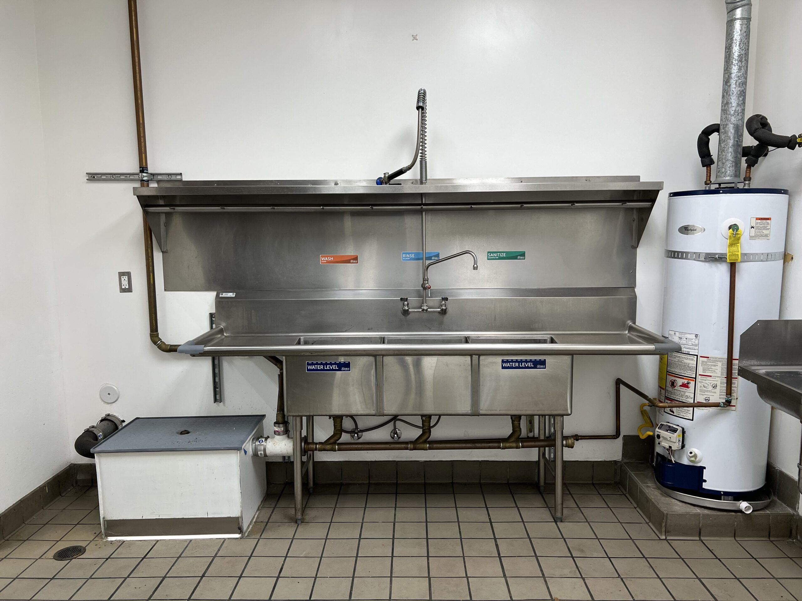 Affordable grease trap installation in a commercial kitchen
