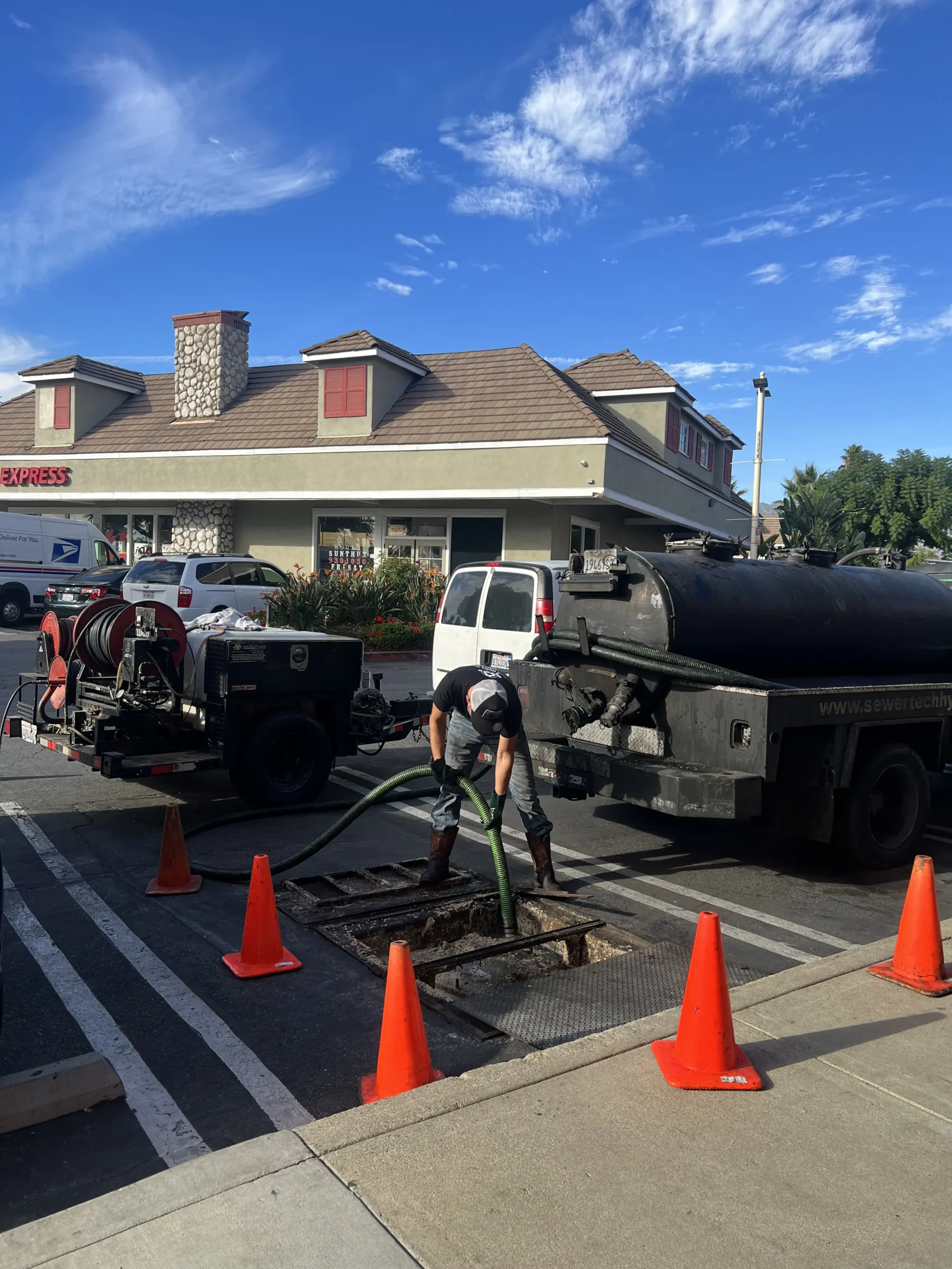 The Grease Company performing grease trap cleaning, pumping, and fogs disposal at a commercial kitchen in Long Beach