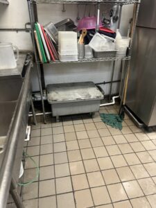 Under-sink grease trap maintenance tips for a restaurant kitchen grease system.
