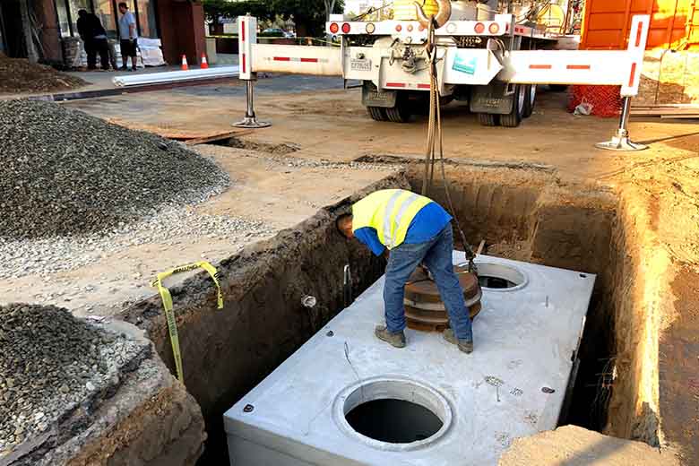Underground grease interceptor installation in food service facility in SoCal